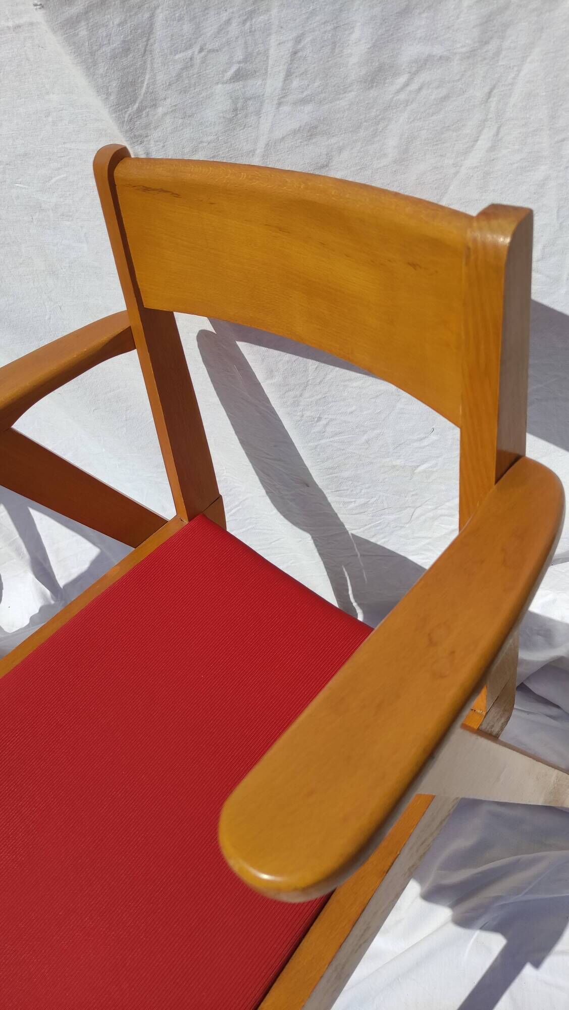 Pair of wooden armchairs and skaï foot compass of the 50s