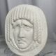Masque de style visage en bas-relief antique