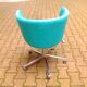 Fauteuil tissu chiné turquoise édité par CB2