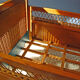 Wooden bed and vintage rattan