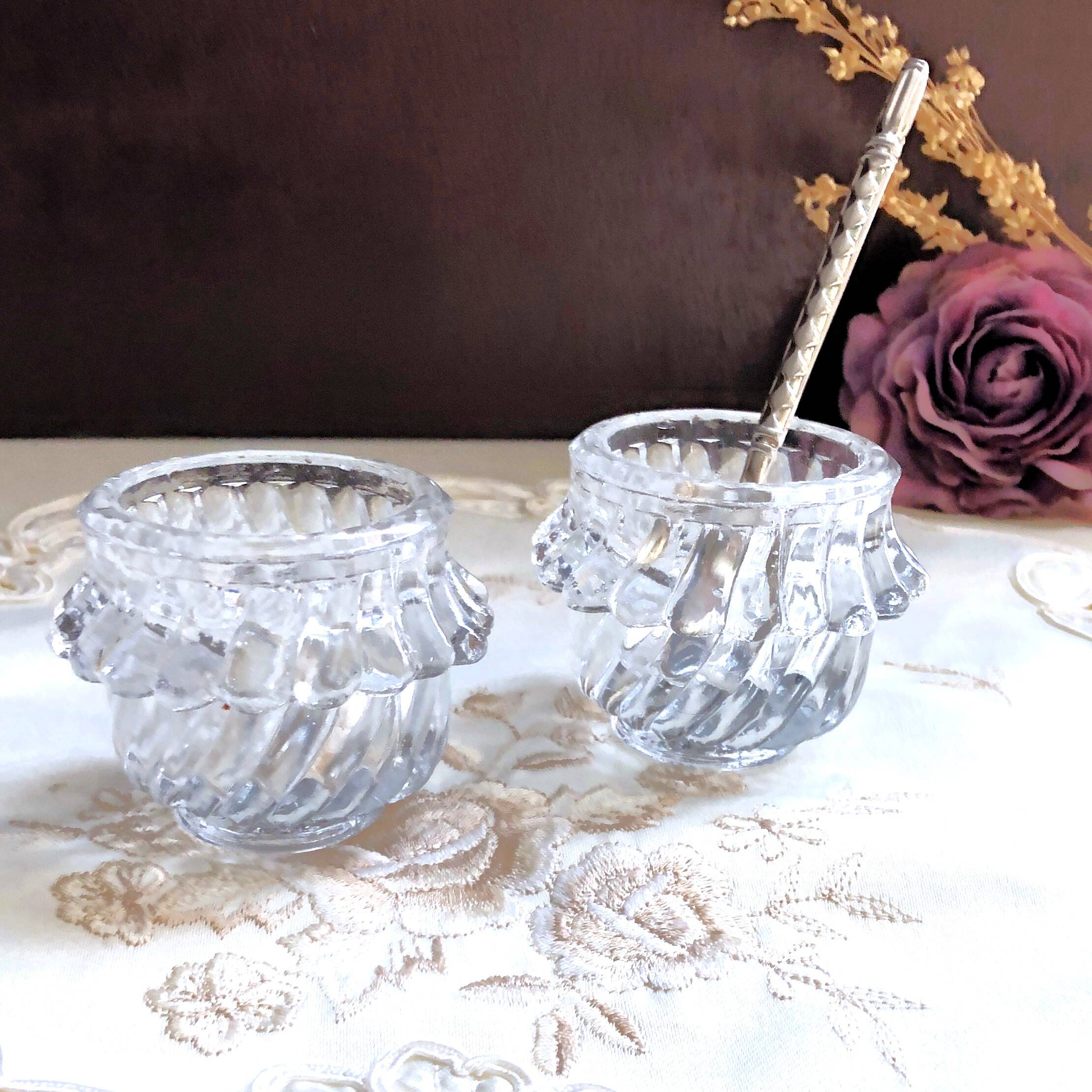 Glass salt and pepper shaker set with vintage serving spoon