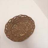 Wall composition of 9 wicker baskets and trays.