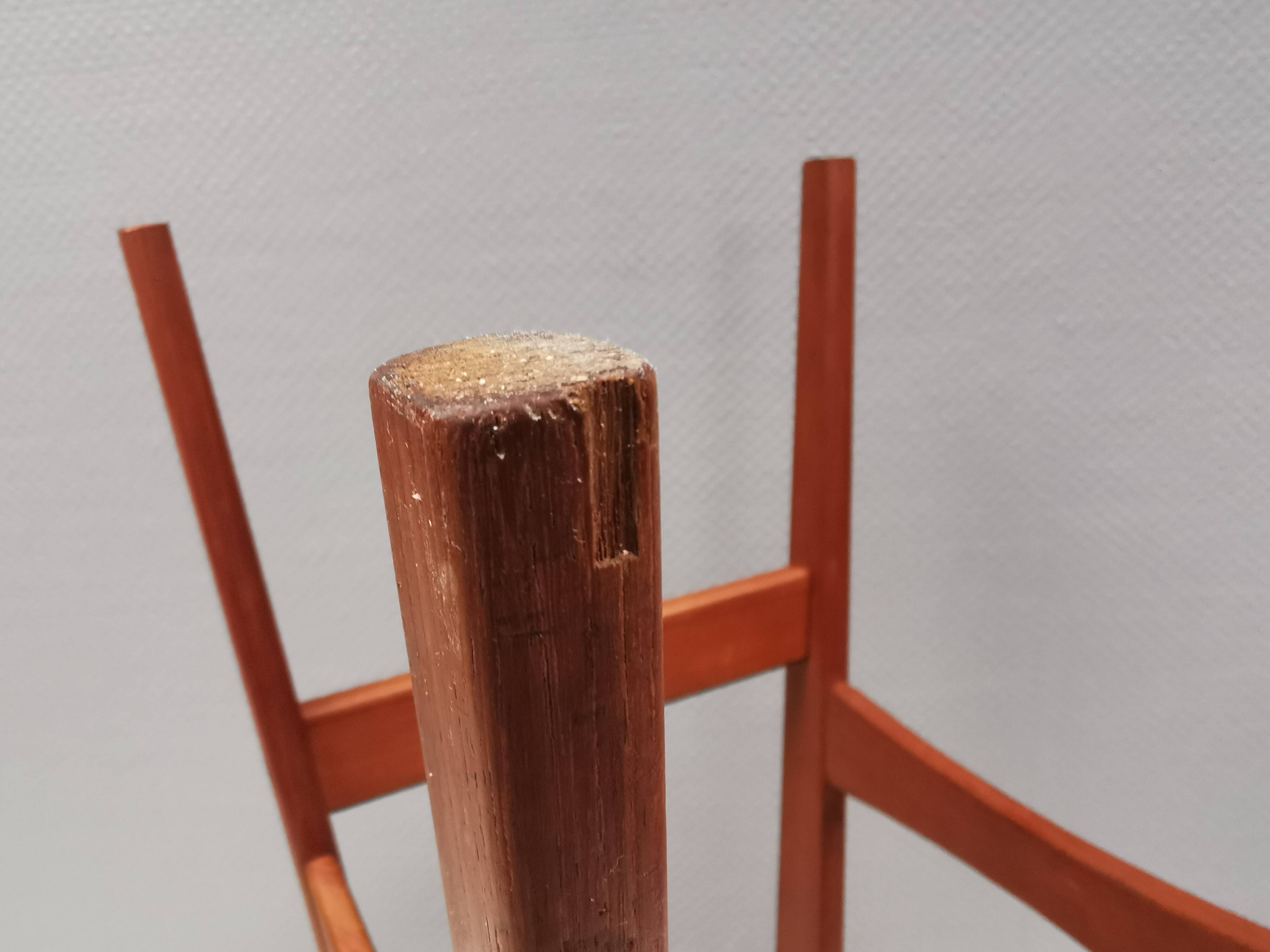 Bar stool, made of teak wood and cognac/red leather. Denmark 1960s