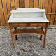 Wood and marble bathroom cabinet