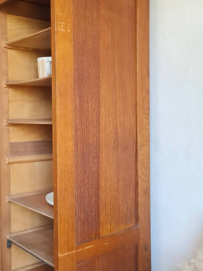 Vintage double curtain filing cabinet.