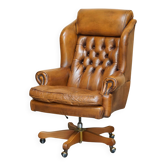 Fauteuil capitaine Chesterfield cuir vintage dossier oreilles capitonné