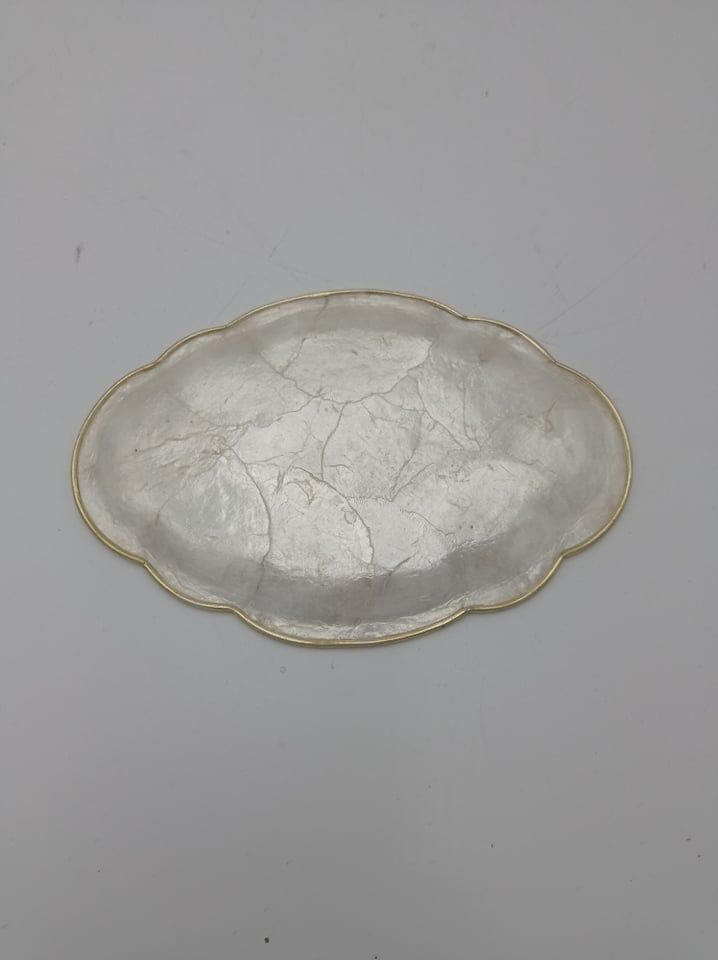 Empty pocket mother-of-pearl cup and gold metal strapping