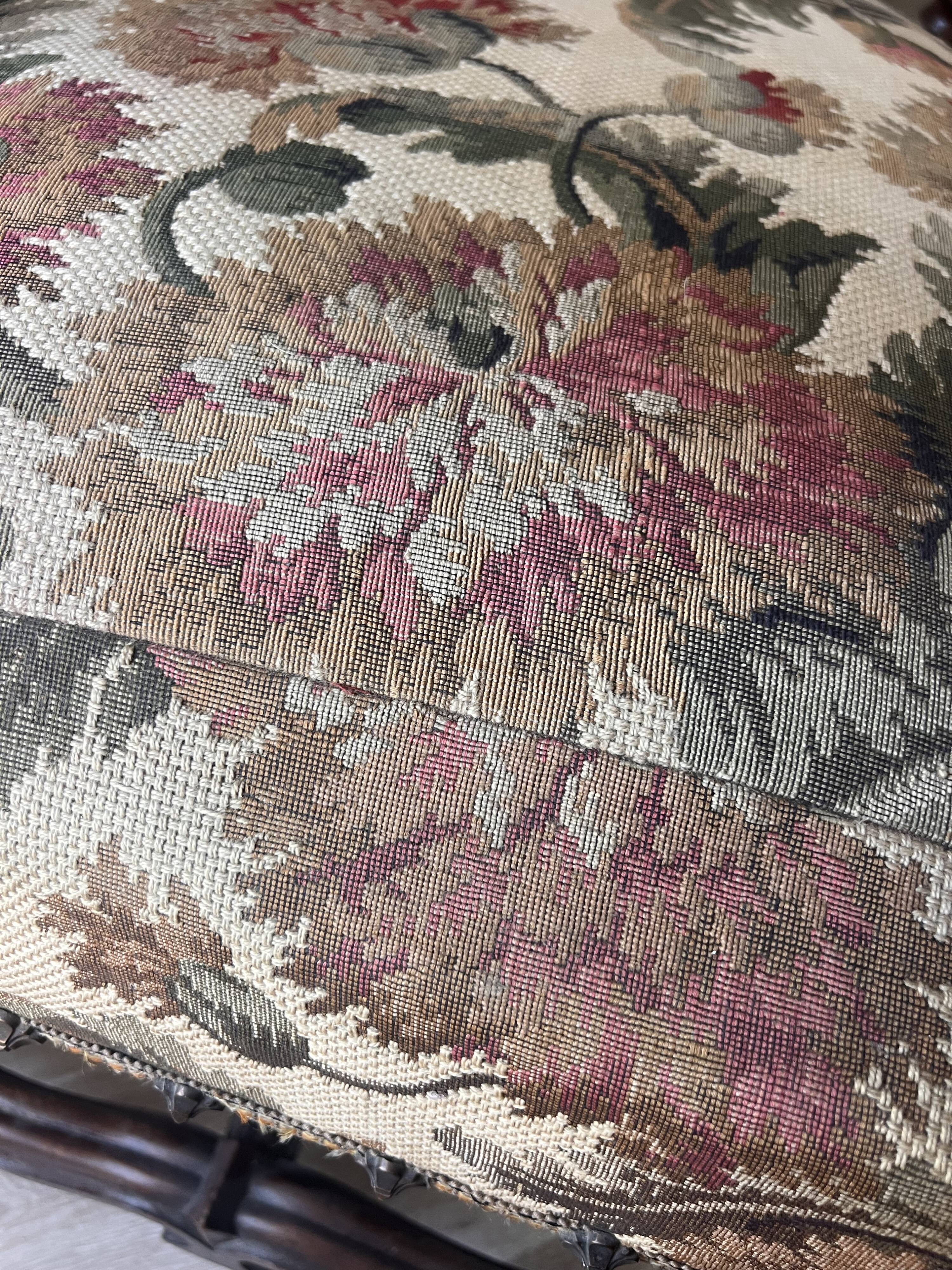 Antique armchair in Henri II style with masks
