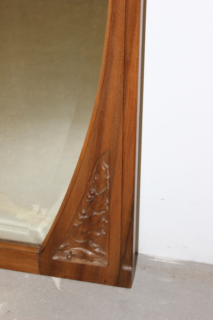 Art Nouveau walnut mirror decorated with holly leaves circa 1900 105x171cm