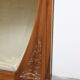 Art Nouveau walnut mirror decorated with holly leaves circa 1900 105x171cm