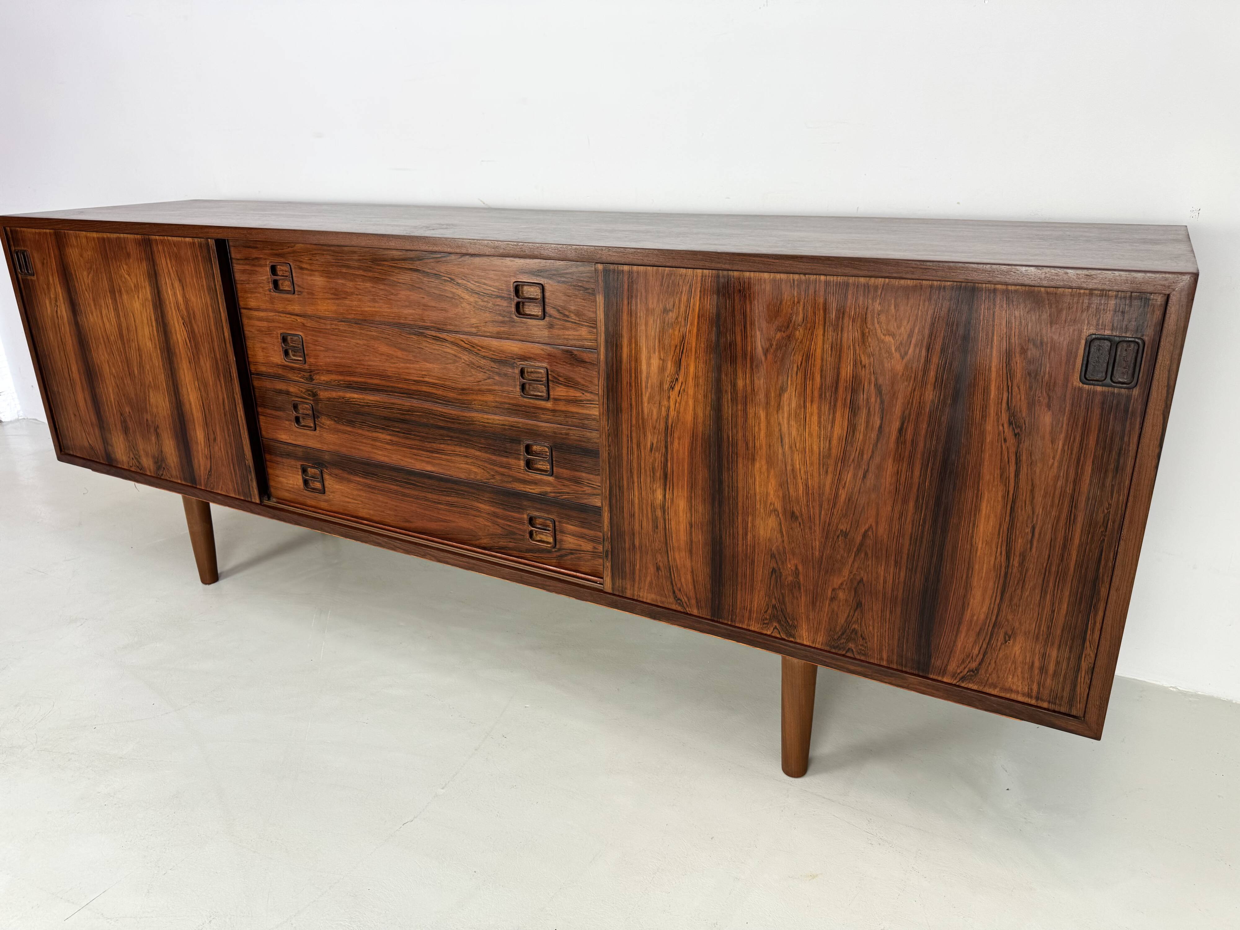 Danish rosewood vintage sideboard with sliding teak doors from the 1960s
