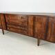Danish rosewood vintage sideboard with sliding teak doors from the 1960s