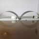 Pair of "SCE" half-moon-shaped band sconces 1980