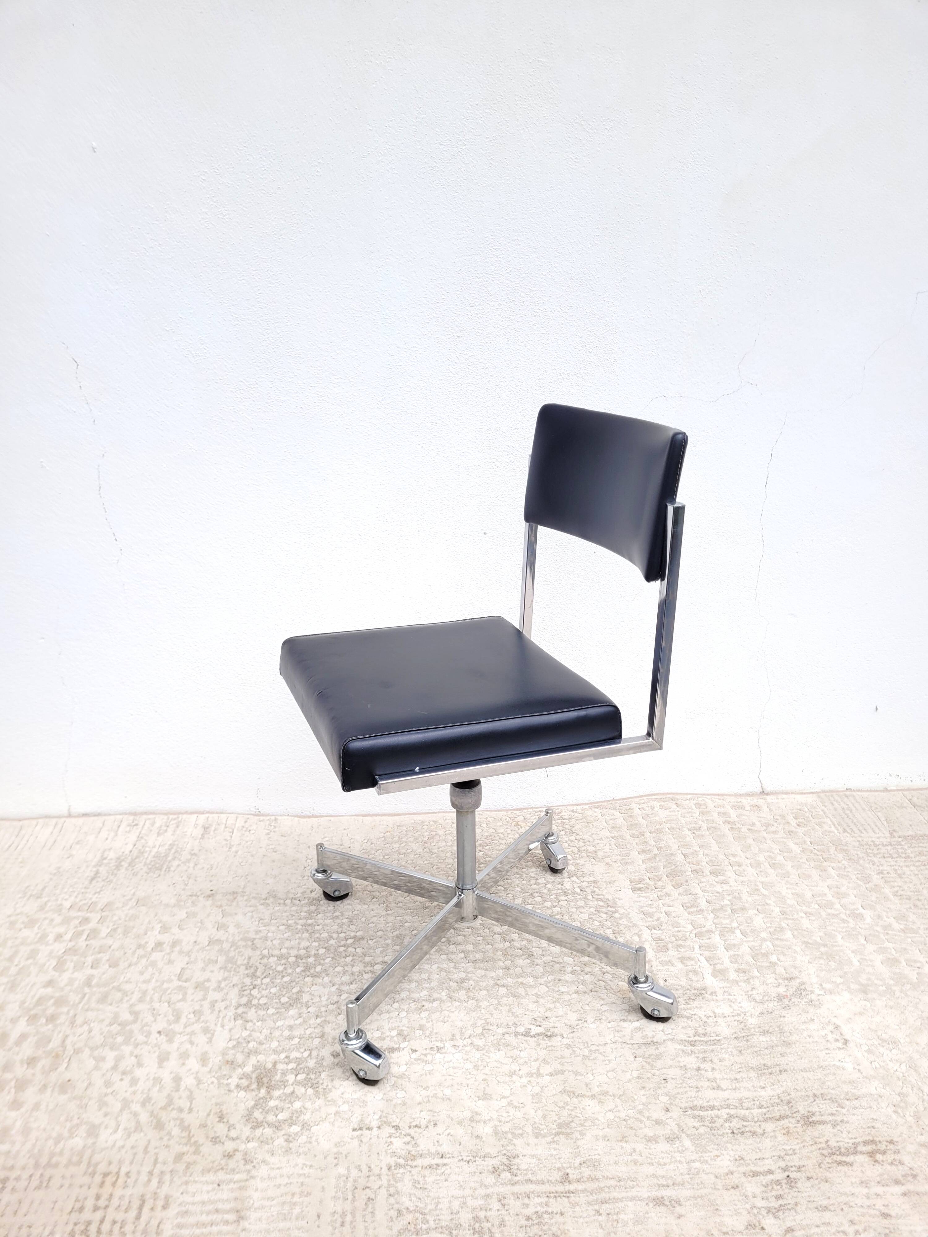 Vintage swivel office chair with casters