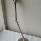 Wall lamp with articulated arm