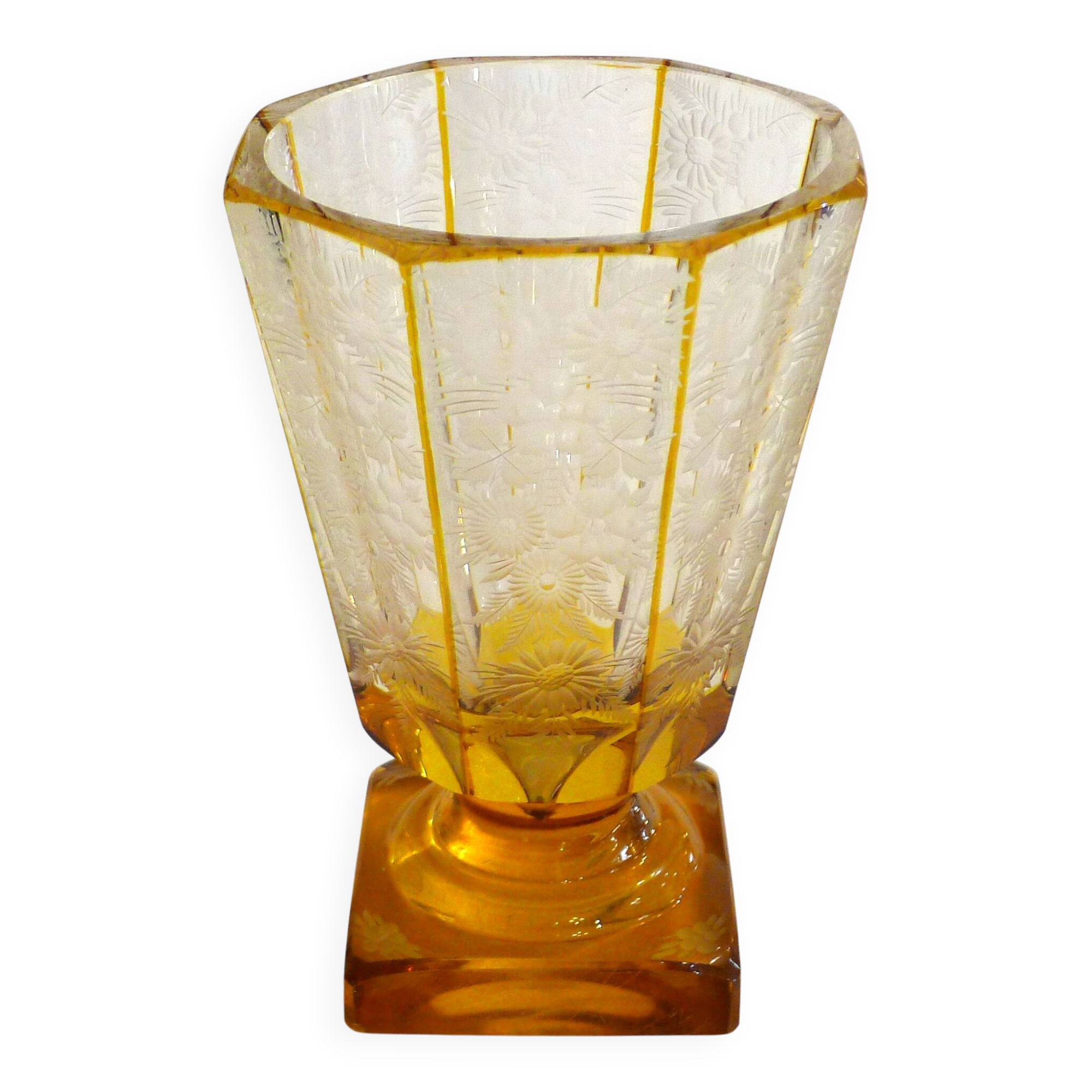 Art Deco vase engraved with flowers, faceted body on a pedestal.