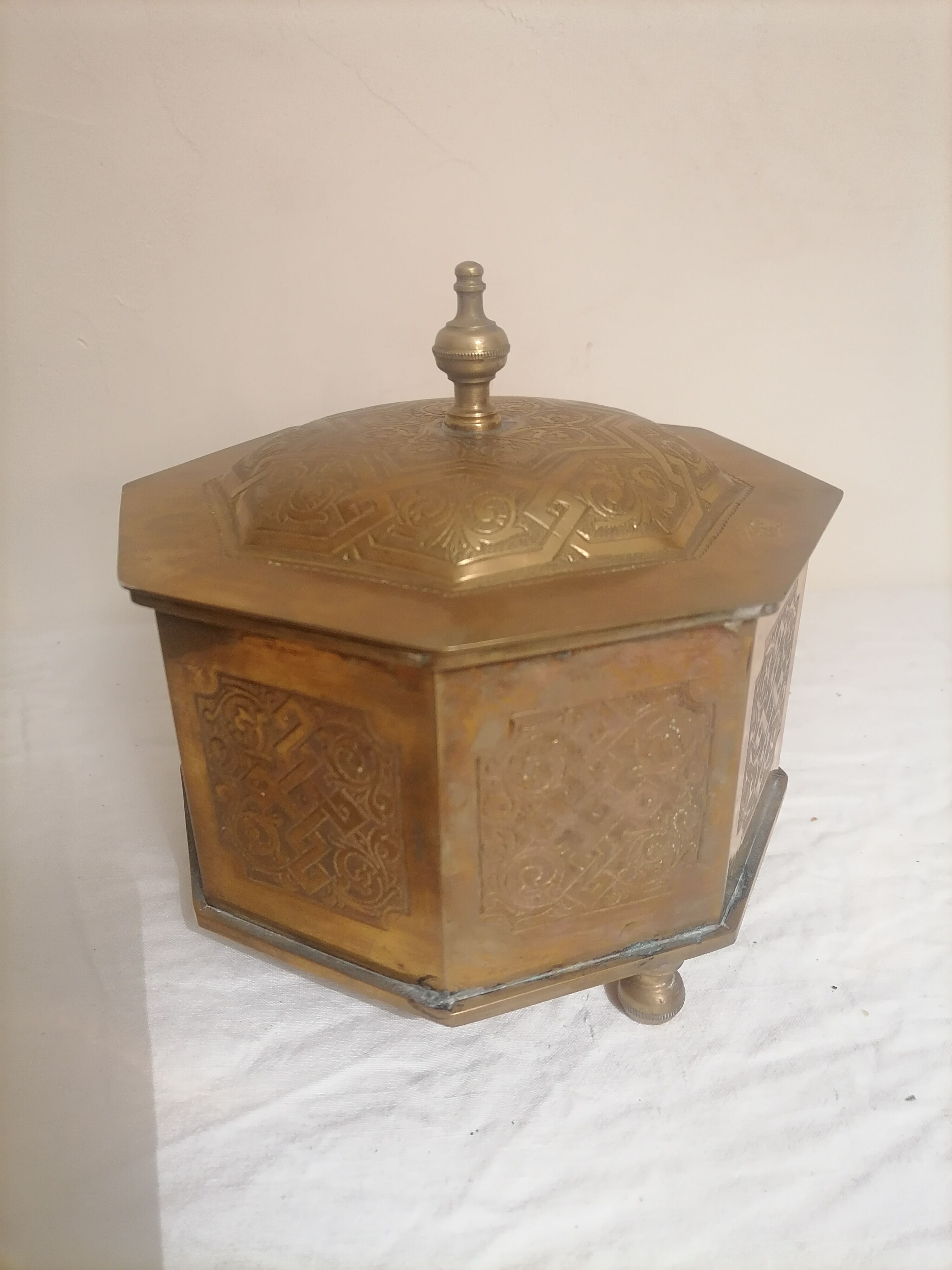 Old oriental tea box in engraved brass