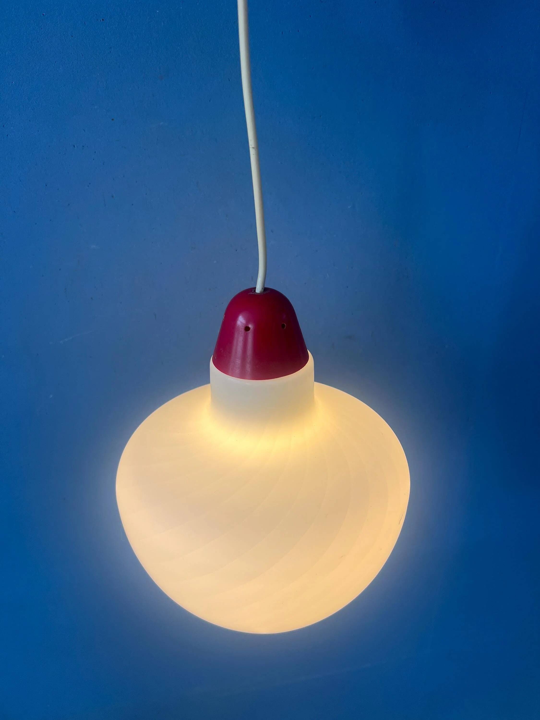 Mid-Century opaline glass suspension with a red upper part and ceiling cover.