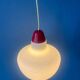 Mid-Century opaline glass suspension with a red upper part and ceiling cover.