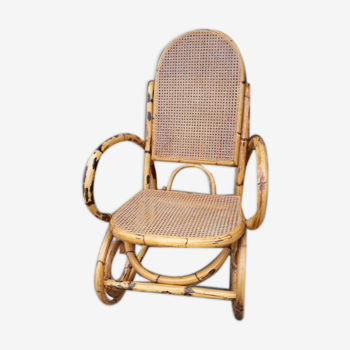 Rocking-chair in rattan and canning