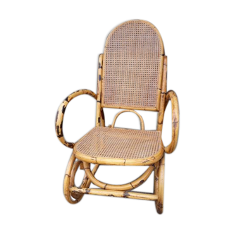 Rocking-chair in rattan and canning