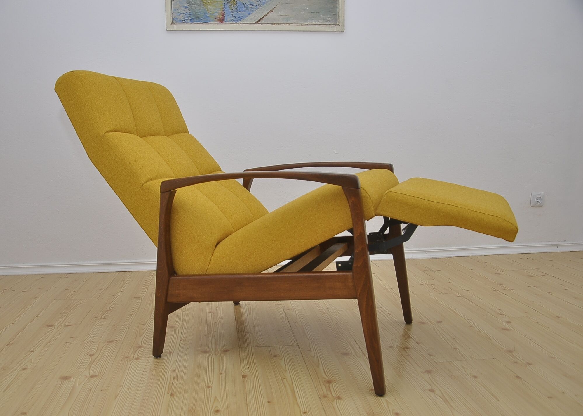 Mid-century armchair with folding footrest, 1960s