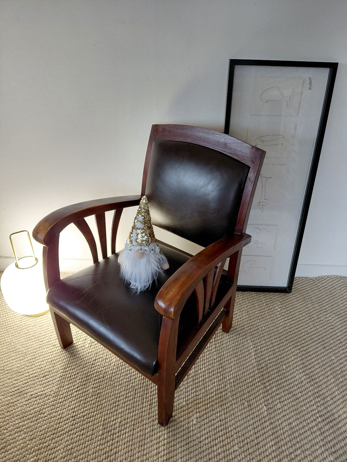 Colonial style wooden armchair