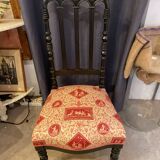 Fireplace or changing chair period 1900 in black lacquered wood and printed fabric