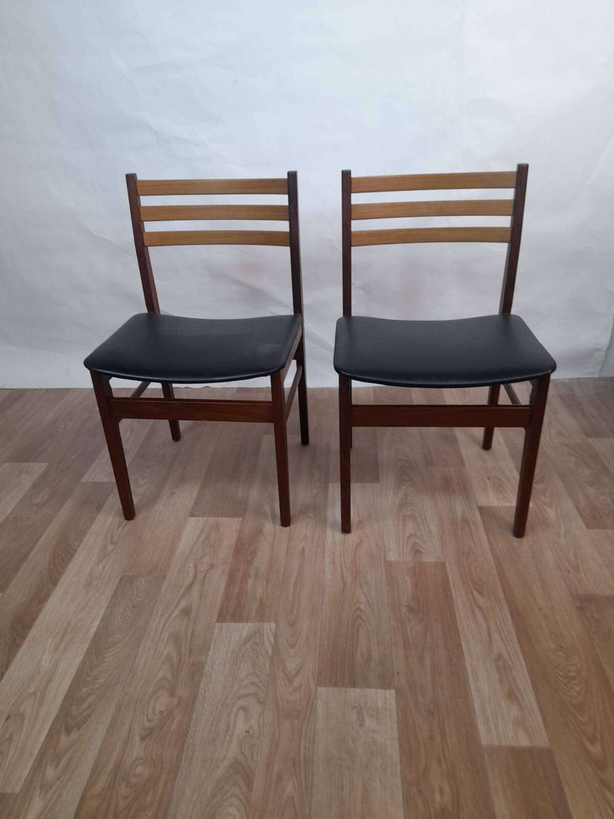 Pair of Scandinavian teak and black leatherette chairs – Denmark 1960