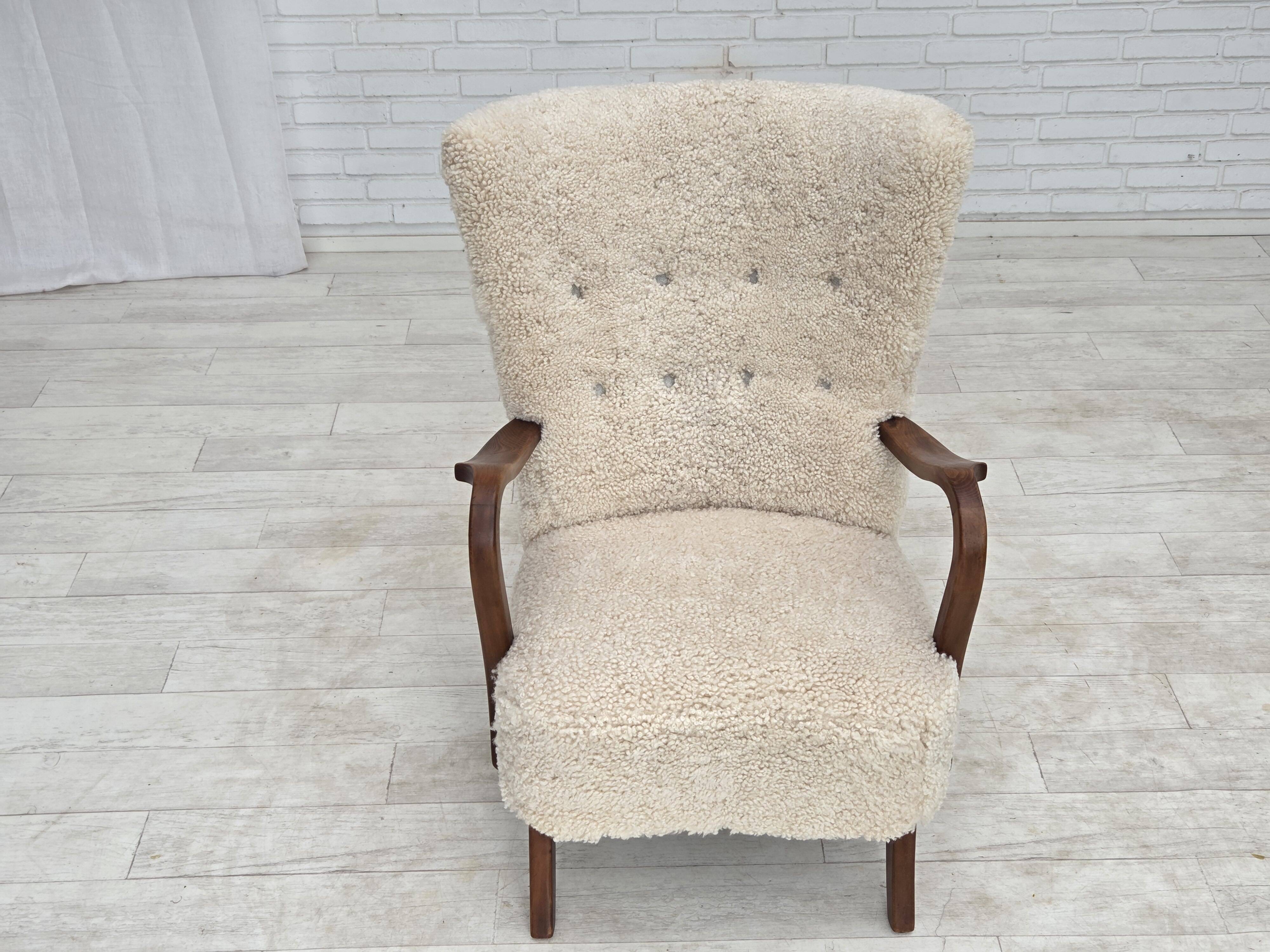1960s, Danish design by Alfred Christensen, reupholstered, sheepskin.