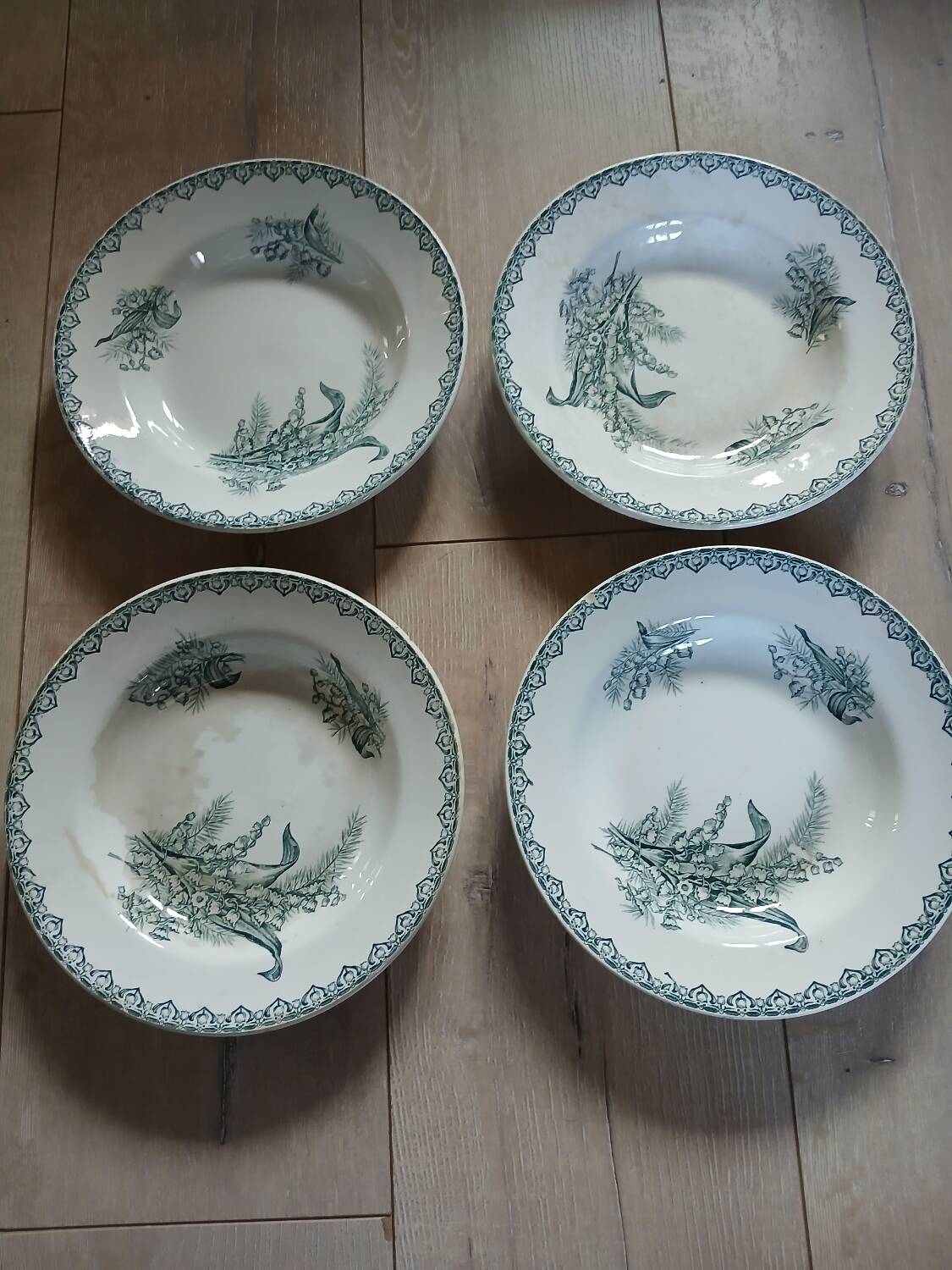 4 Terre de fer soup plates with lily of the valley motifs