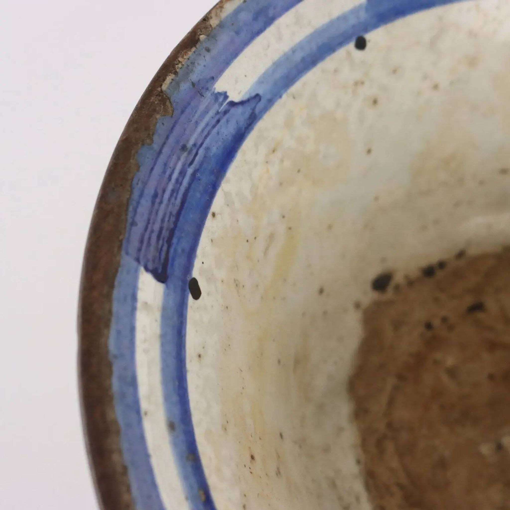 Antique cup from the early 19th century in decorated terracotta.