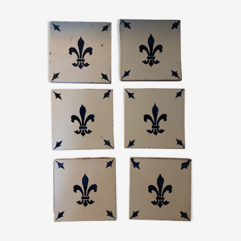 Desvres faiënce tiles with fleut de Lys pattern