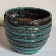 Ceramic planter with speckled enamel gadroons from the 1940s