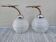 Pair of frosted glass wall lights with brass attachments, circa 1970