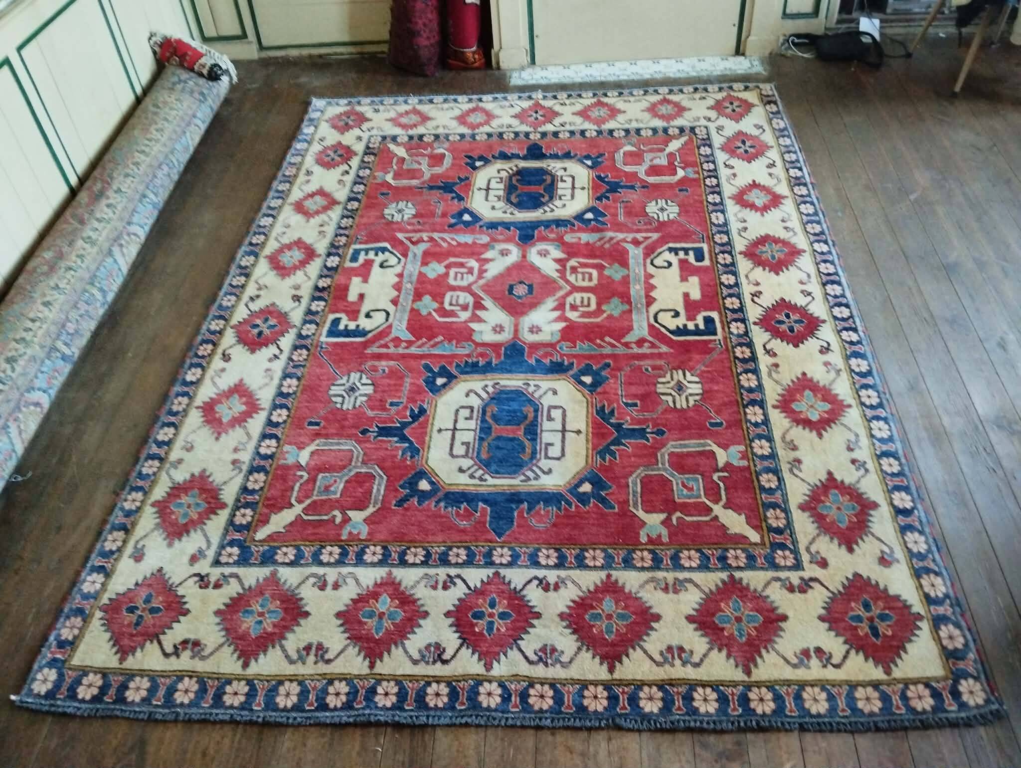 Handmade Pakistani Kazak rug 303x225cm