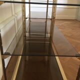 Pair of consoles brass shelves and smoked glass design Roche Bobois