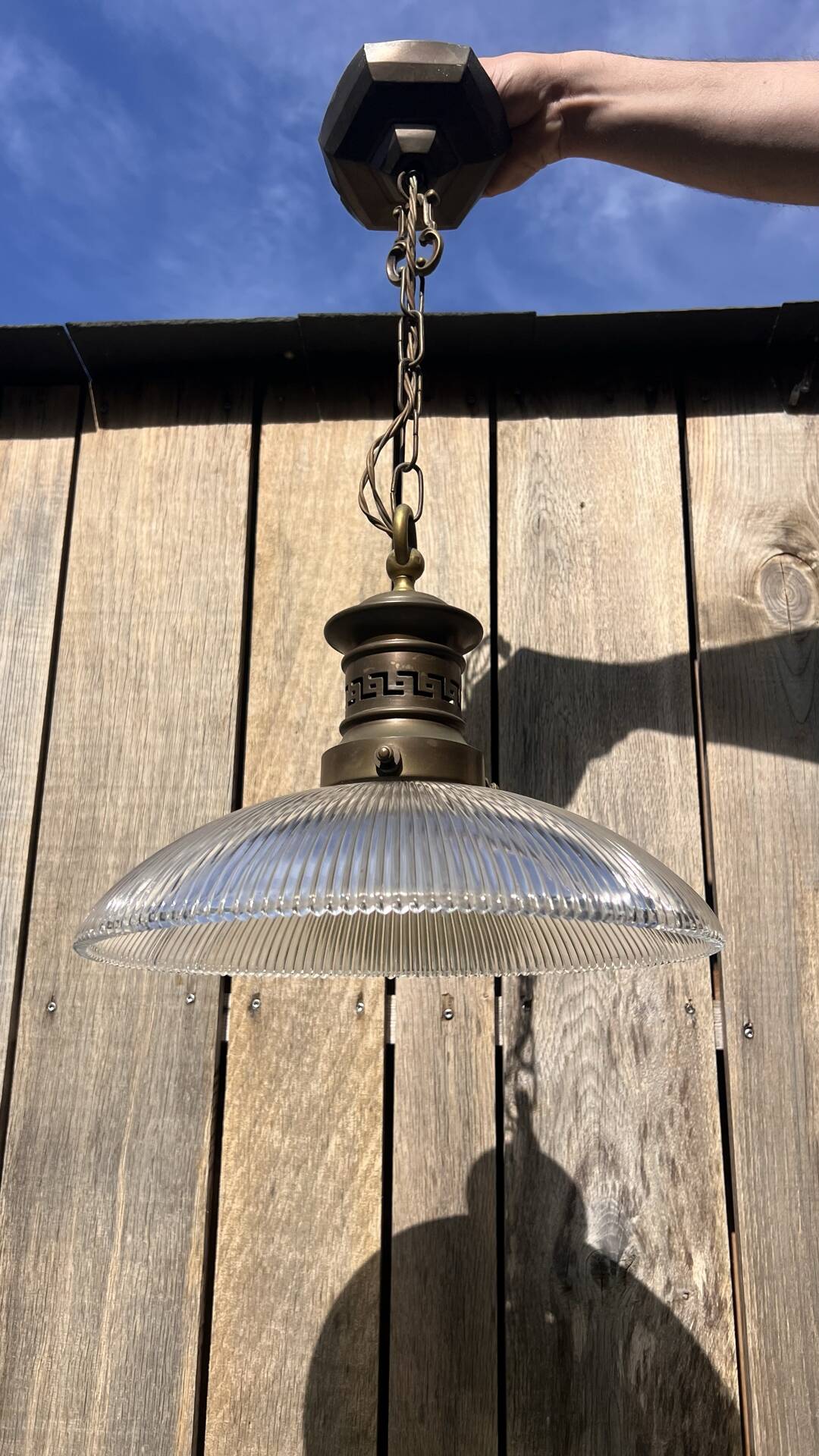 Art Deco suspension from the 1930s in glass and brass.