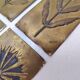 Six cleanliness plaques, flower design, brass.