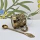 Solid brass teacup and spoon with Art Nouveau flower decor