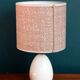 Table lamp in wool tweed and foot in cream color wood