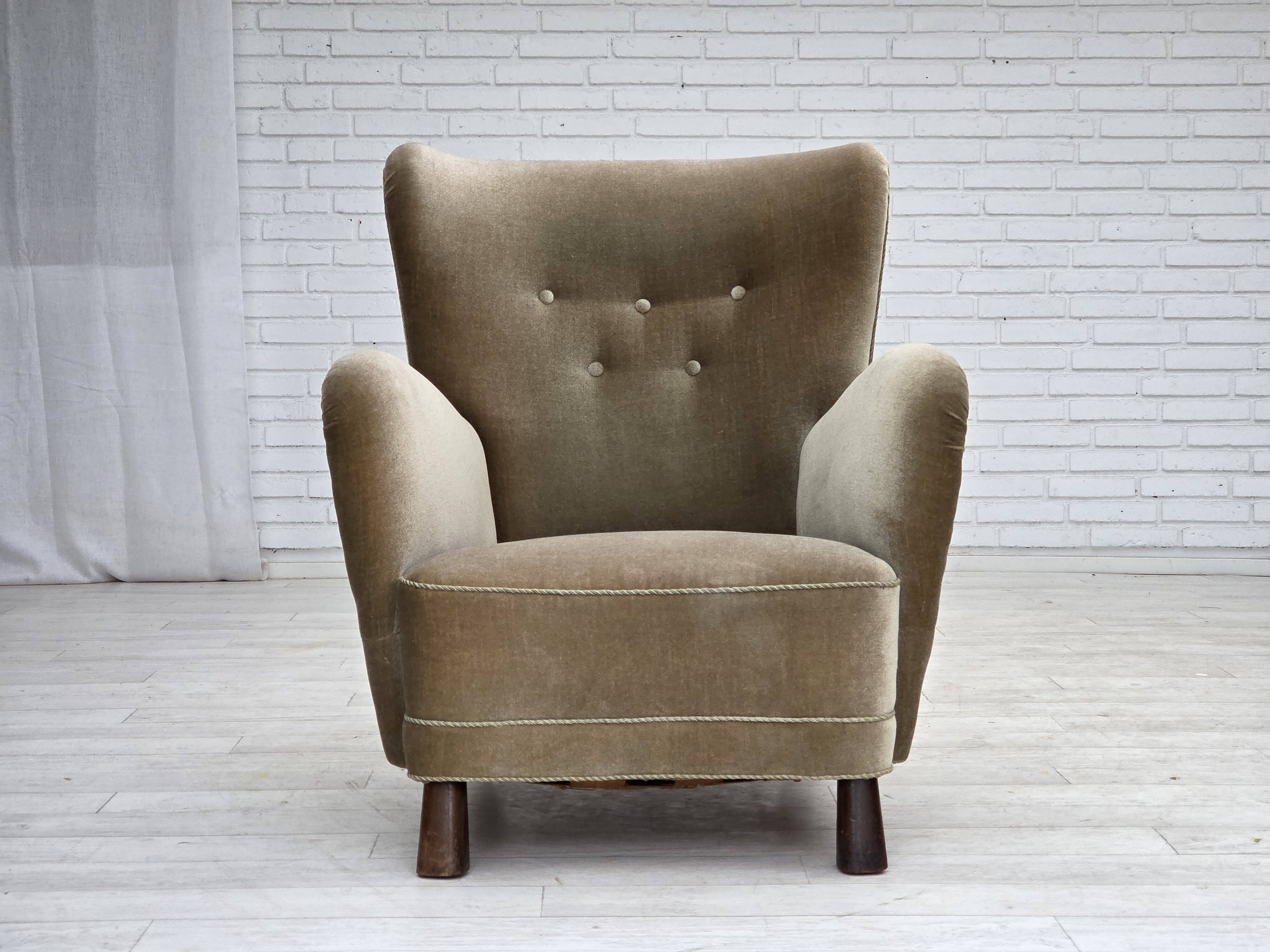 1960s, Danish armchair, green furniture velour, oak wood legs.
