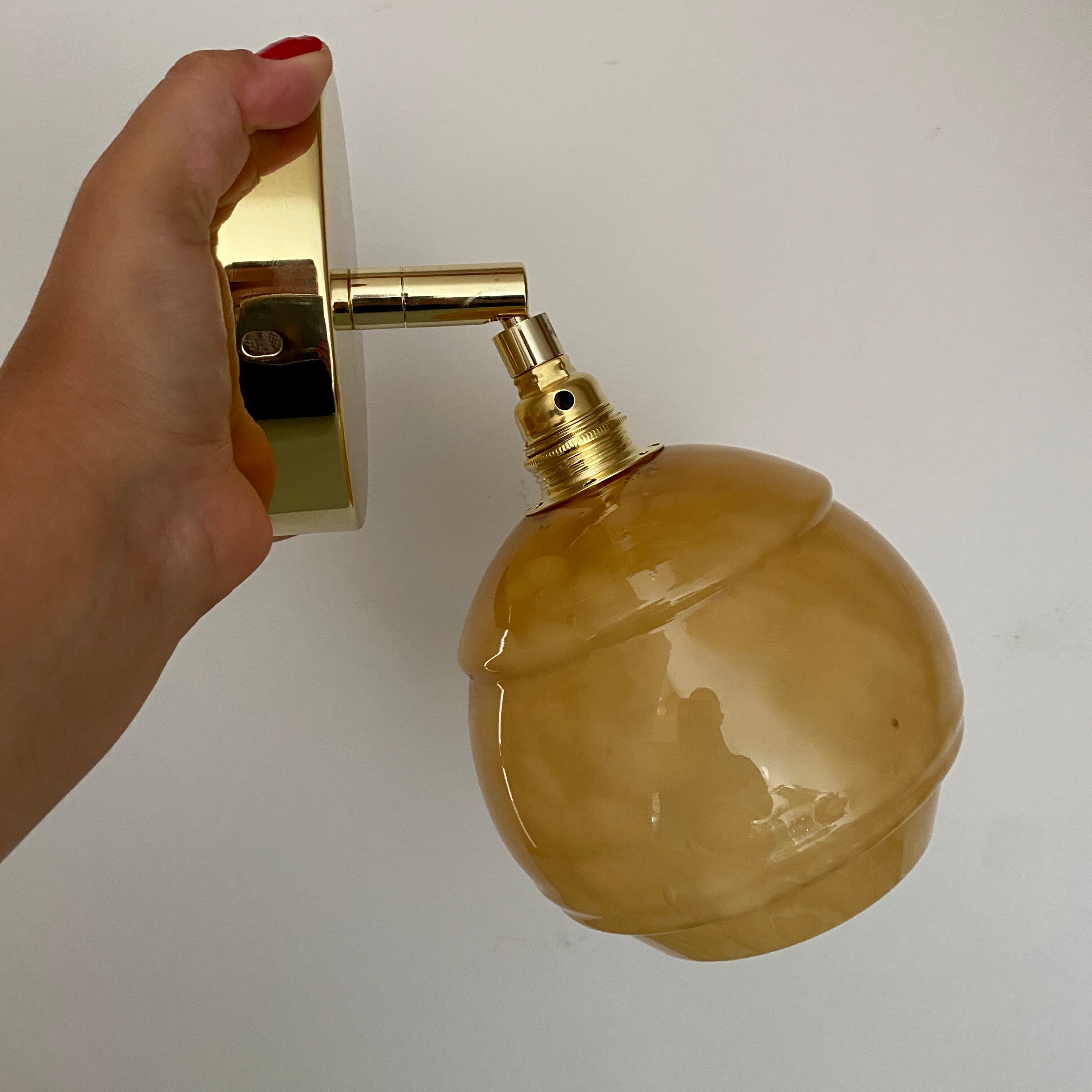 Vintage globe wall light in yellow Clichy glass