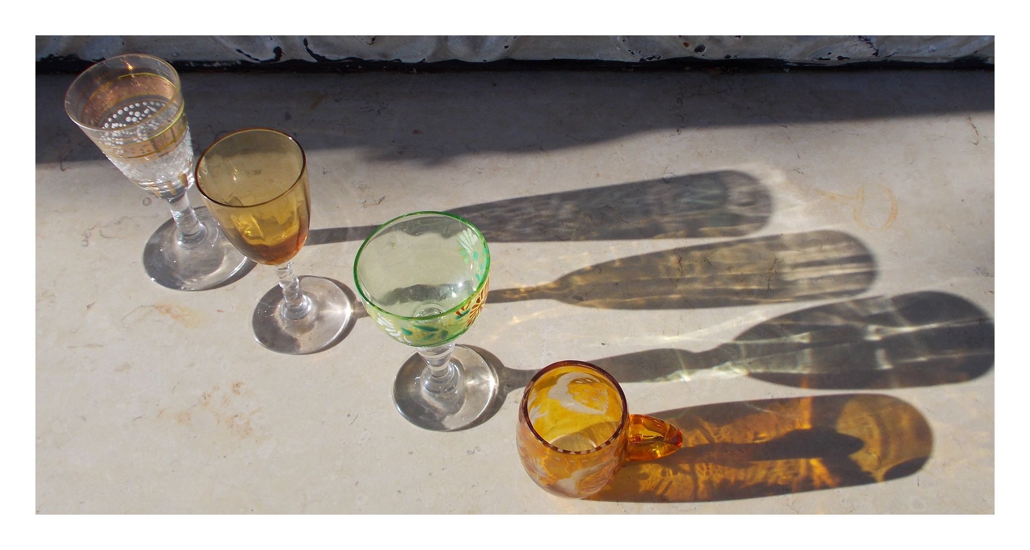 4 old enamelled liqueur glasses