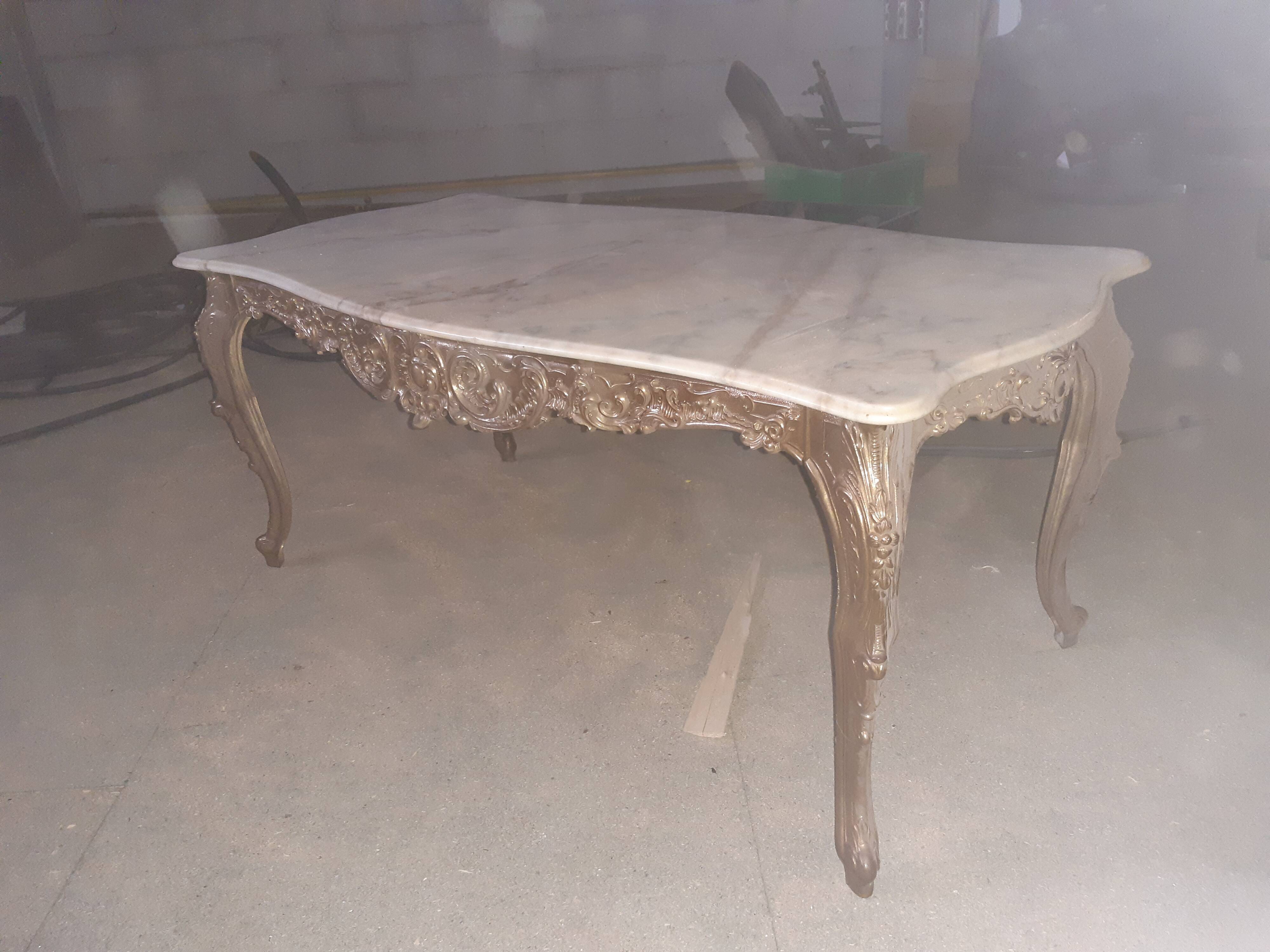 Pedestrian coffee table above marble