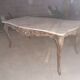 Pedestrian coffee table above marble