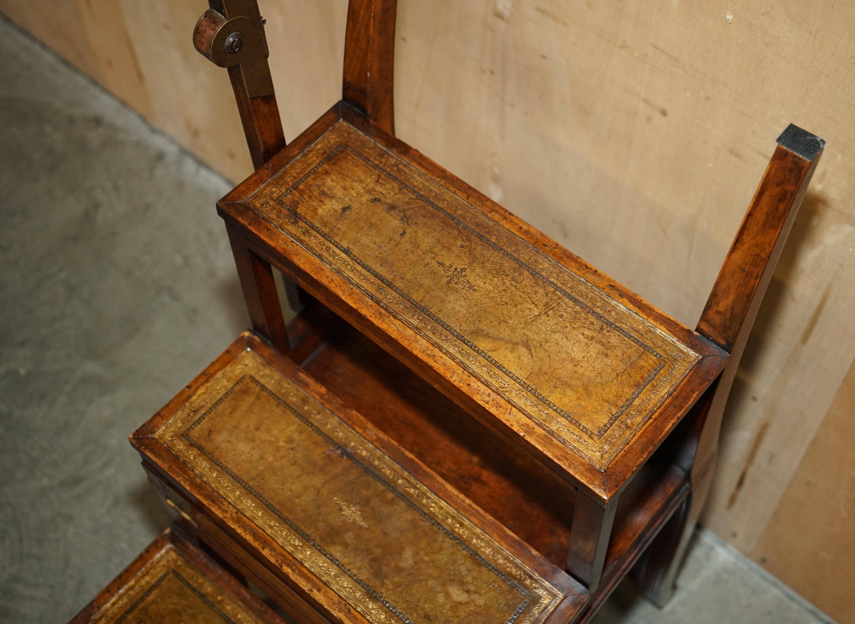 Victorian library chair, convertible, hardwood, leather, brass, circa 1880.