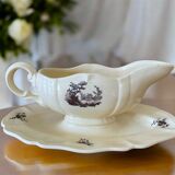 Antique sauce boat in Sarreguemines earthenware.