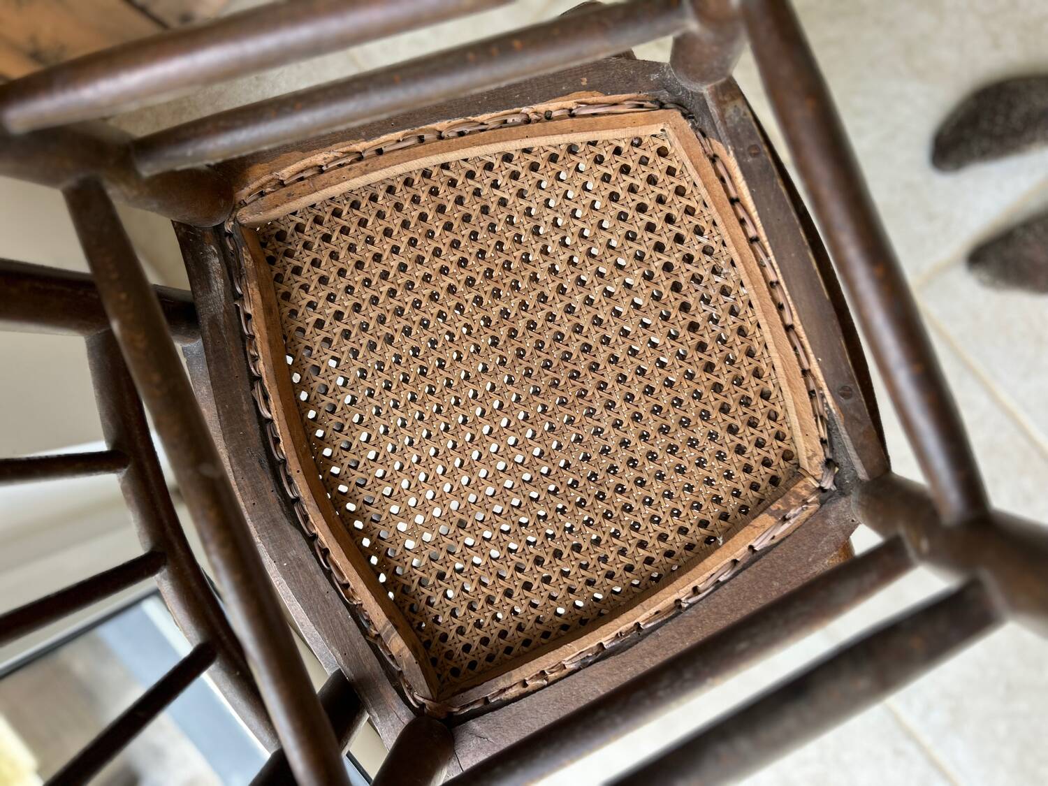 Pair of cane bistro chairs