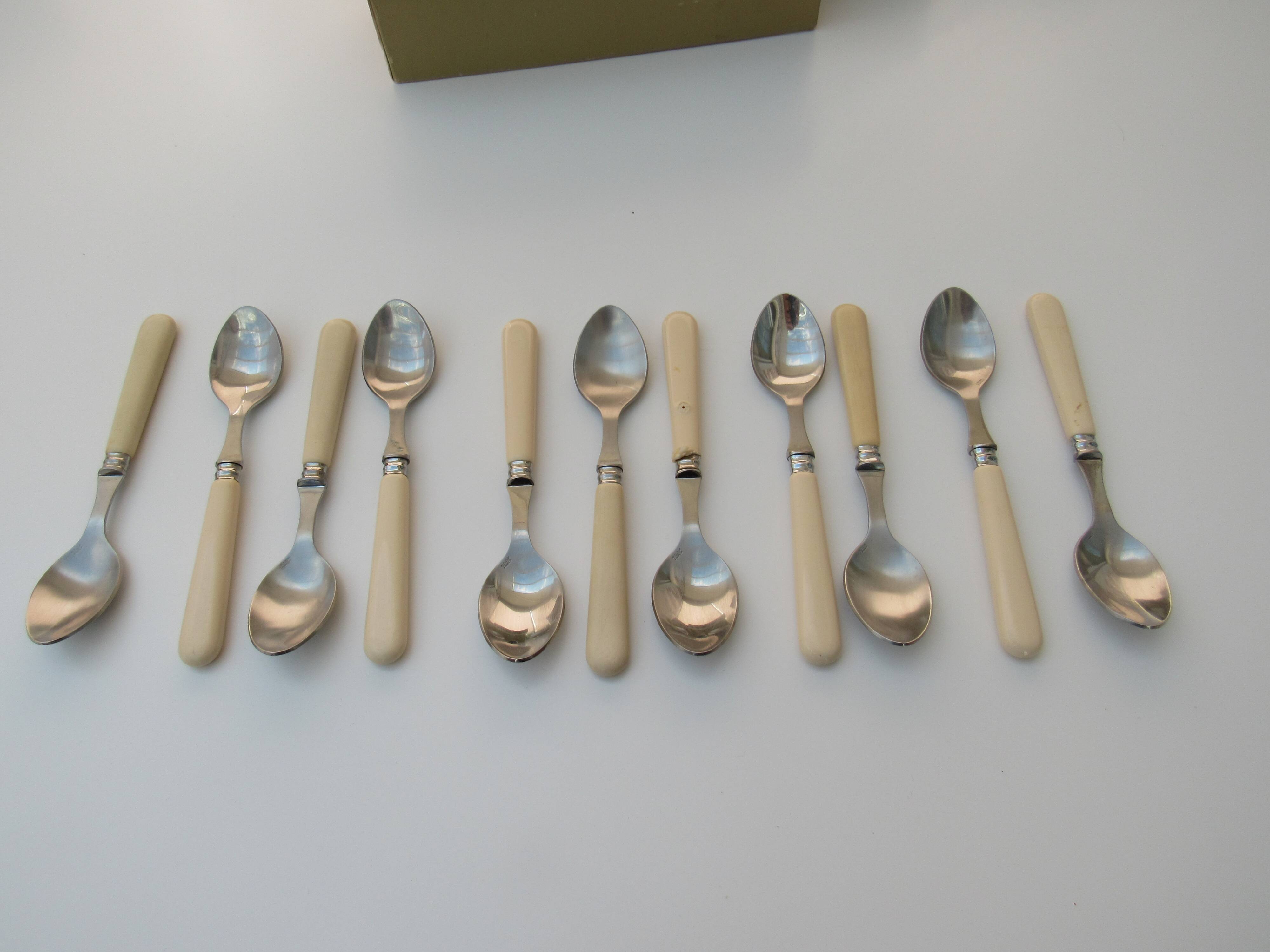 Set of 46 Cambridge ivory cutlery Scof France